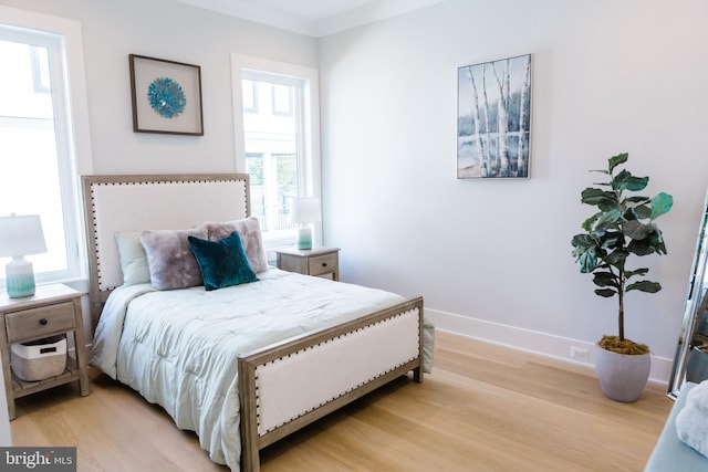 bedroom featuring light hardwood / wood-style floors