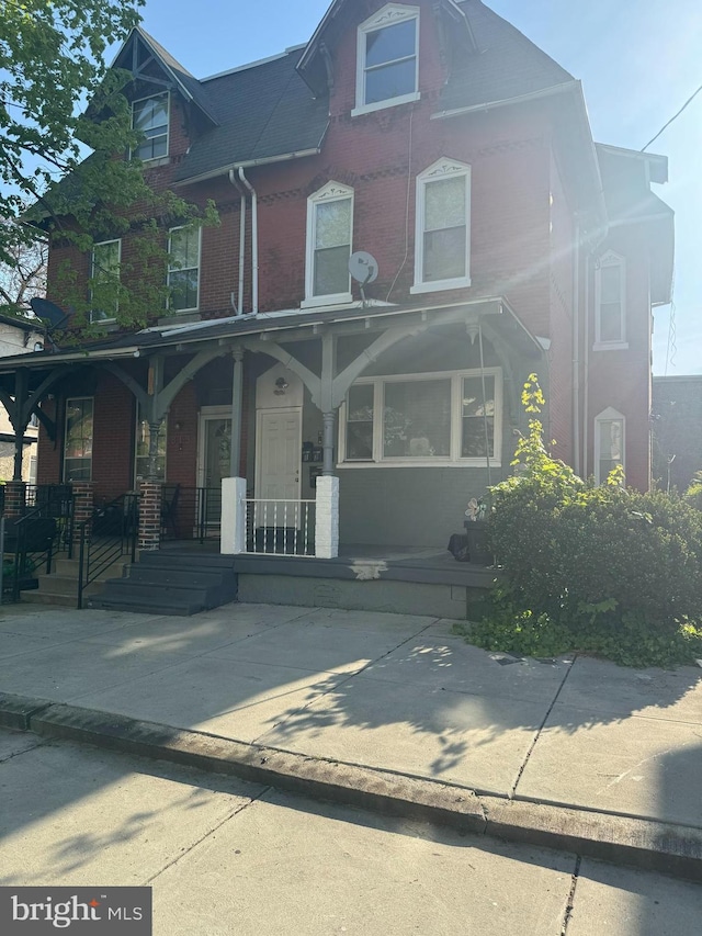 view of front of home featuring covered porch