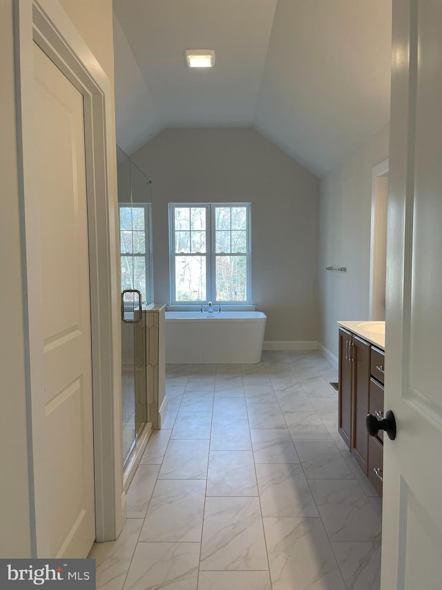 104 Maugers Mill Rd Lot 1, Pottstown, PA 19464 - bathroom featuring marble look tiles, vanity, a bath, a stall shower, and lofted ceiling