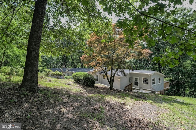 view of yard featuring a deck