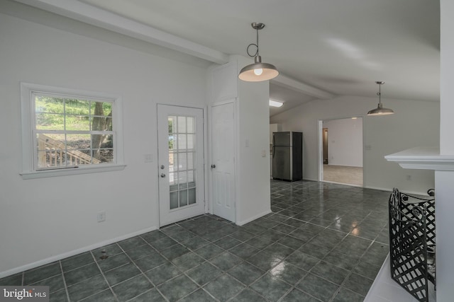 interior space with vaulted ceiling with beams