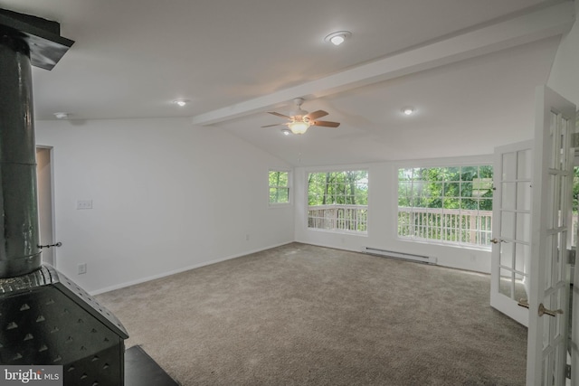 unfurnished living room featuring ceiling fan, french doors, baseboard heating, vaulted ceiling with beams, and carpet