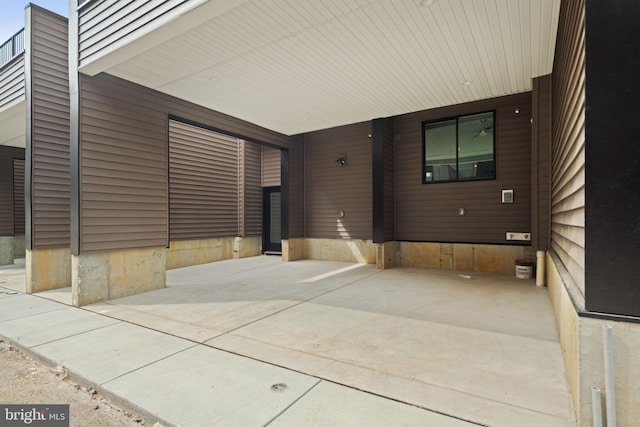 view of patio with a carport