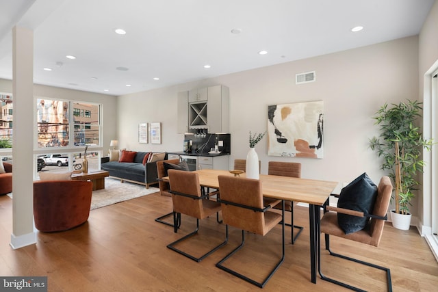 dining space featuring light hardwood / wood-style flooring