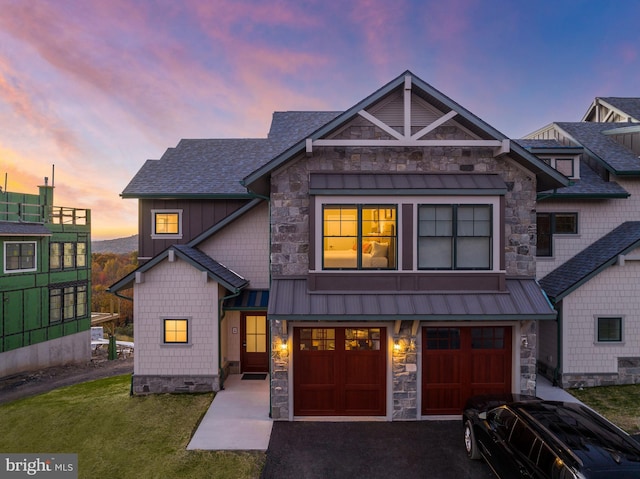 craftsman inspired home with a garage