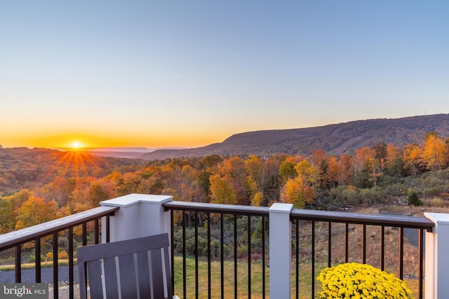 property view of mountains with a wooded view