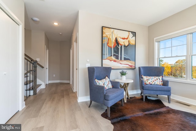 sitting room featuring hardwood / wood-style flooring