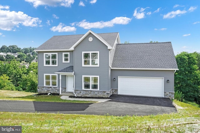 view of front of home featuring a garage