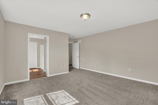 unfurnished bedroom with carpet