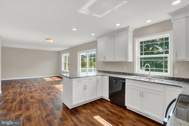 kitchen with sink, stove, white cabinetry, black dishwasher, and light stone counters