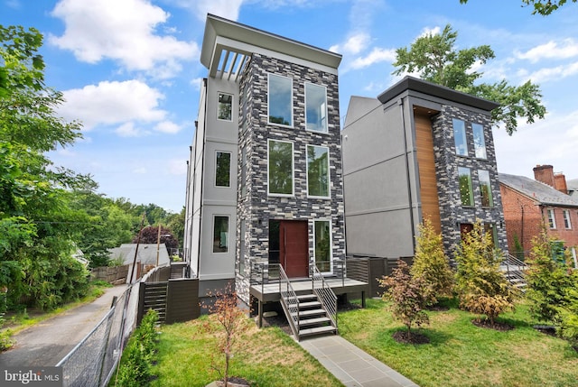 view of front of house with a front lawn