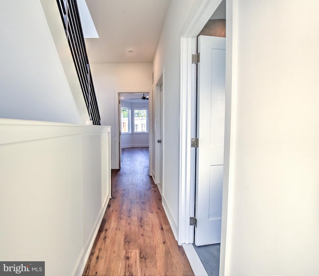 corridor featuring light hardwood / wood-style floors