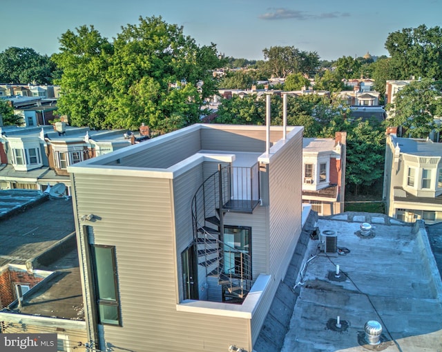 exterior space featuring central AC unit