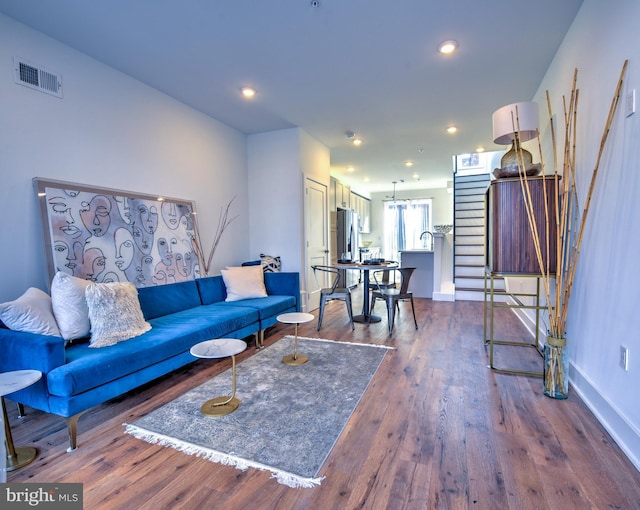 living room featuring dark hardwood / wood-style floors