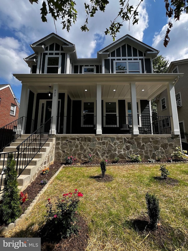 920 Brompton St, Fredericksburg, VA 22401 - view of front of property with a porch, a front lawn, and stone siding