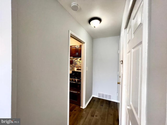 hall featuring dark hardwood / wood-style flooring