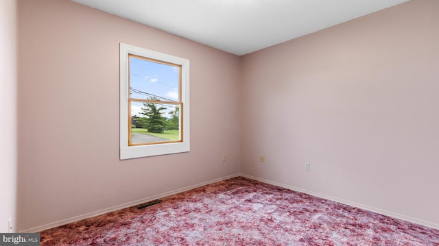 view of carpeted spare room