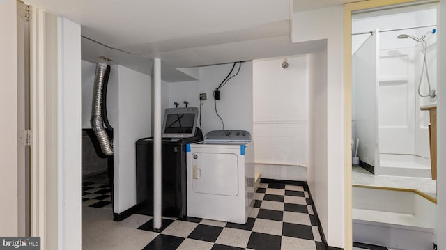 laundry area featuring washing machine and dryer