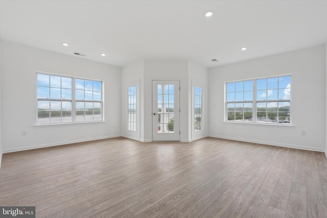 16333 River View Ct, Bristol, PA 19007 - unfurnished living room with wood finished floors, baseboards, and recessed lighting