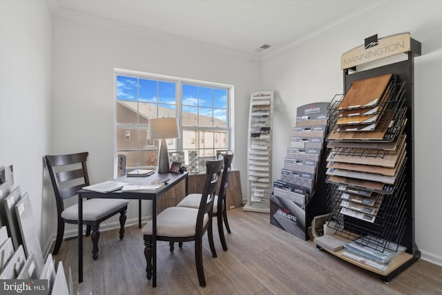 office featuring crown molding and hardwood / wood-style floors