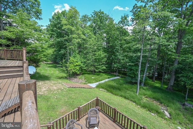 view of yard with a wooden deck