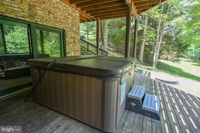 exterior space with a hot tub