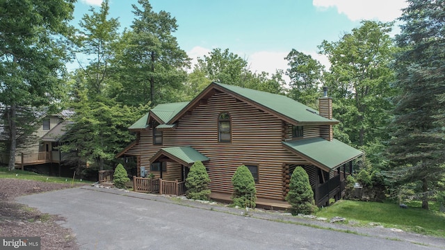 view of log cabin