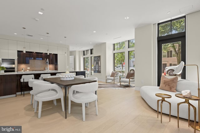 dining room featuring light hardwood / wood-style floors