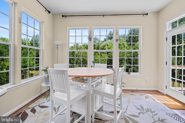 sunroom / solarium featuring plenty of natural light