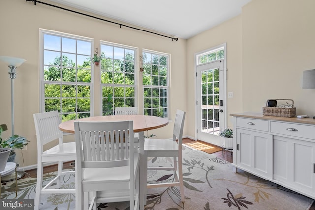 dining room with light wood-type flooring