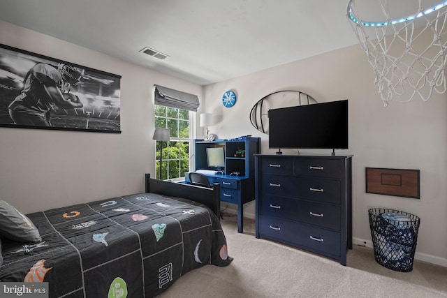 bedroom with light colored carpet