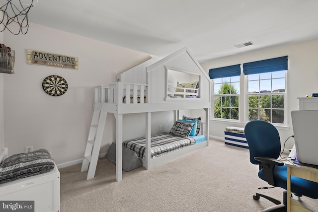 bedroom with light carpet