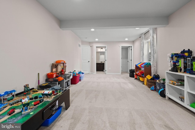 game room with light carpet