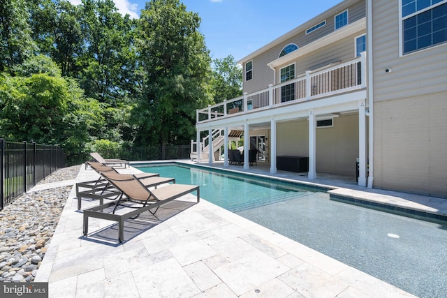 view of pool featuring a patio area