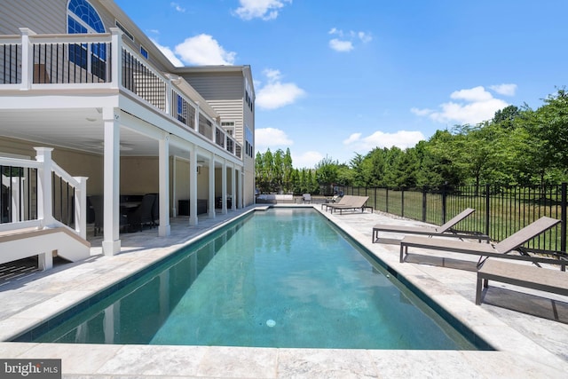 view of swimming pool with a patio