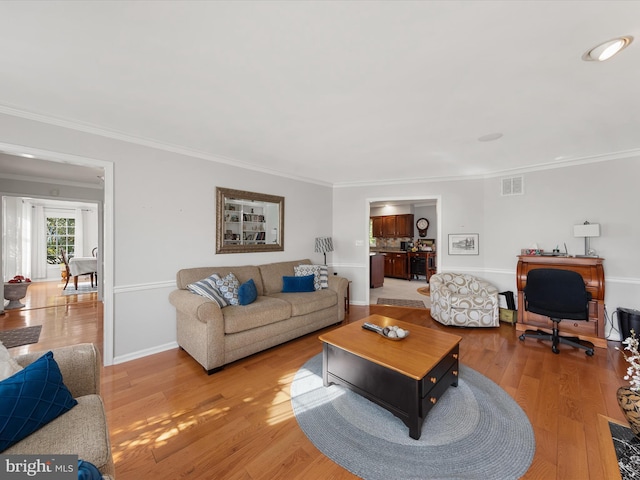 30602 Foxchase Dr, Salisbury, MD 21804 - living room with visible vents, baseboards, crown molding, and light wood-type flooring