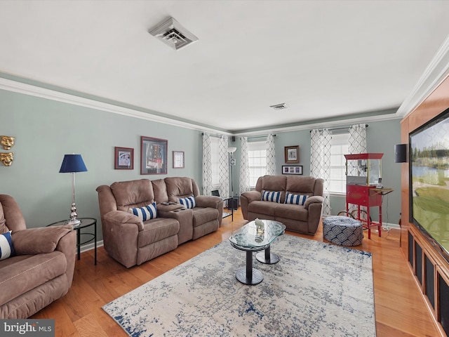 30602 Foxchase Dr, Salisbury, MD 21804 - living room with crown molding, baseboards, light wood-style floors, and visible vents