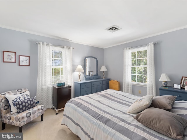 carpeted bedroom featuring ornamental molding