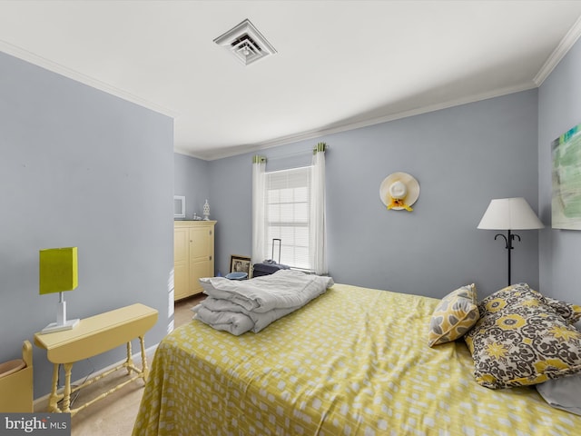 carpeted bedroom featuring crown molding