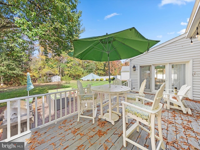 30602 Foxchase Dr, Salisbury, MD 21804 - wooden deck featuring a lawn and outdoor dining space
