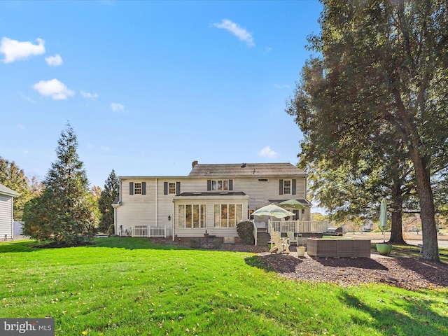 30602 Foxchase Dr, Salisbury, MD 21804 - rear view of house featuring a lawn, outdoor lounge area, and a chimney