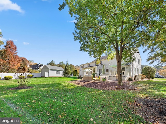 view of yard with a wooden deck