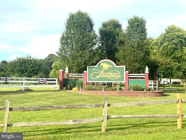 view of community featuring a yard