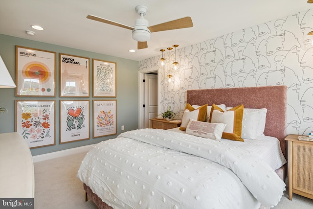 carpeted bedroom with ceiling fan