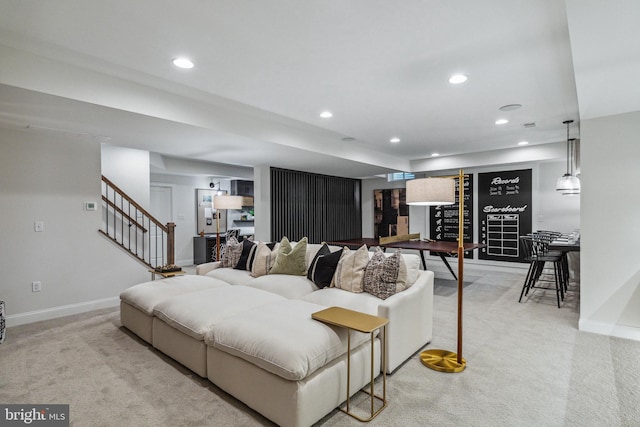 living room featuring light colored carpet