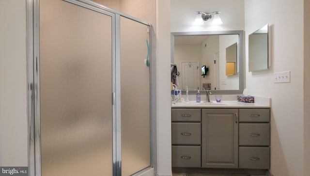 bathroom featuring vanity and walk in shower