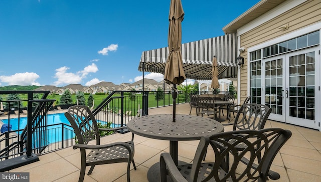 view of patio / terrace with a community pool