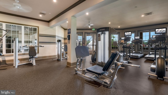 workout area featuring ceiling fan and crown molding