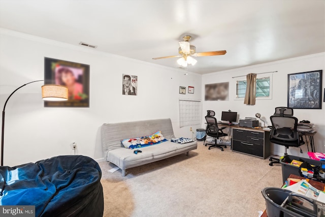 office featuring carpet, visible vents, and crown molding