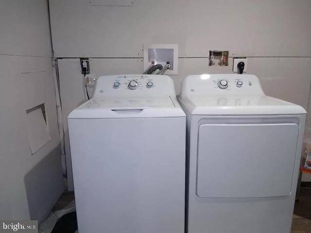 laundry room with laundry area and separate washer and dryer